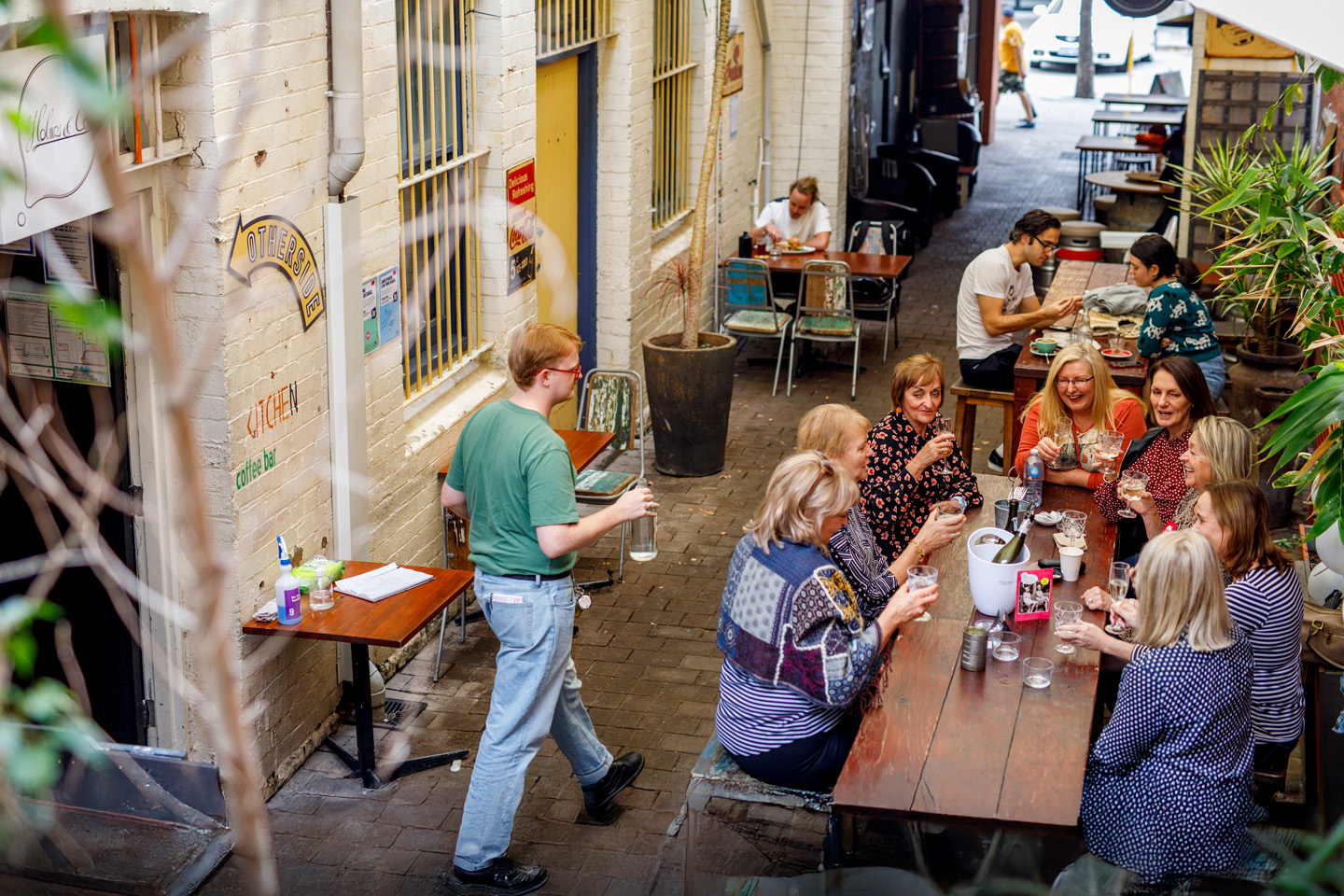 People at laneway cafe