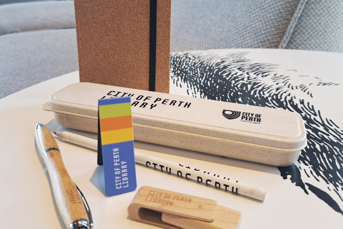 City of Perth Library branded merchandise displayed on a table