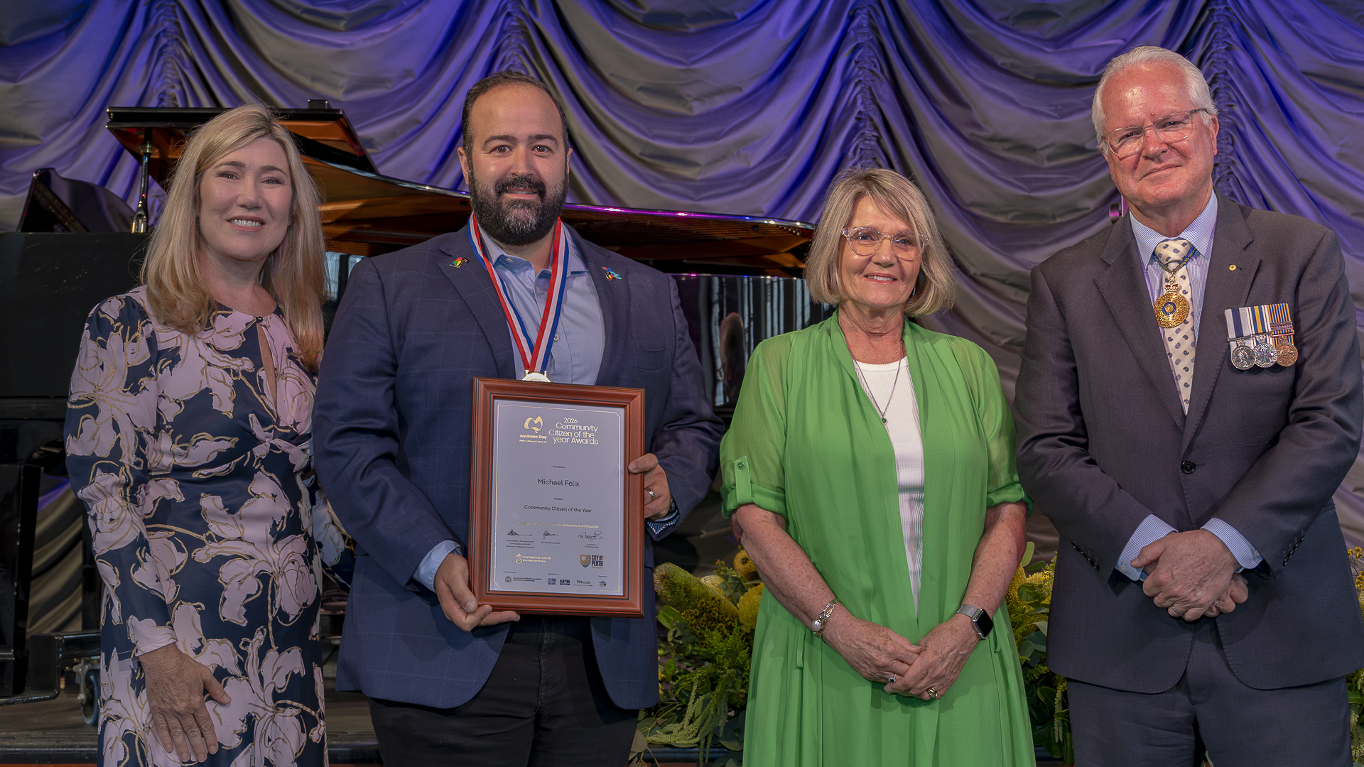 Michael Felix accepting the Community Citizen of the Year award.