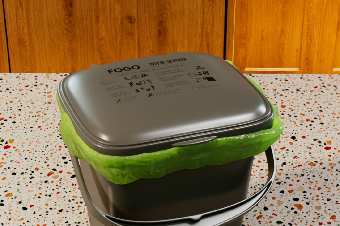 A FOGO caddy on a kitchen bench