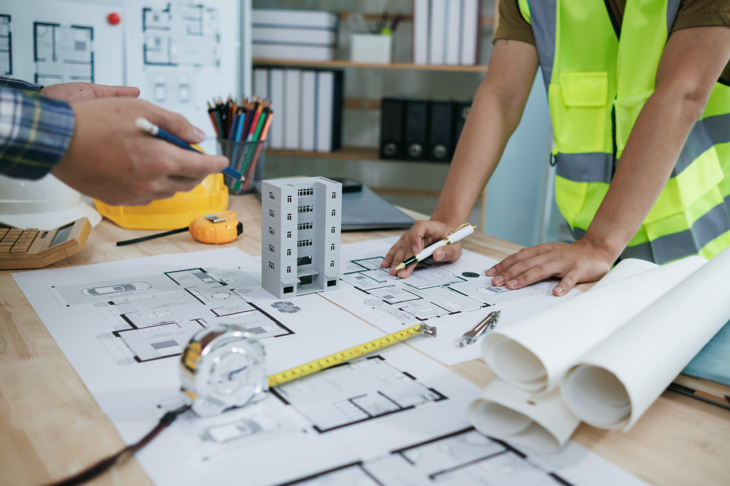 People with building plans