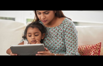 Mother and child watching storytime on tablet